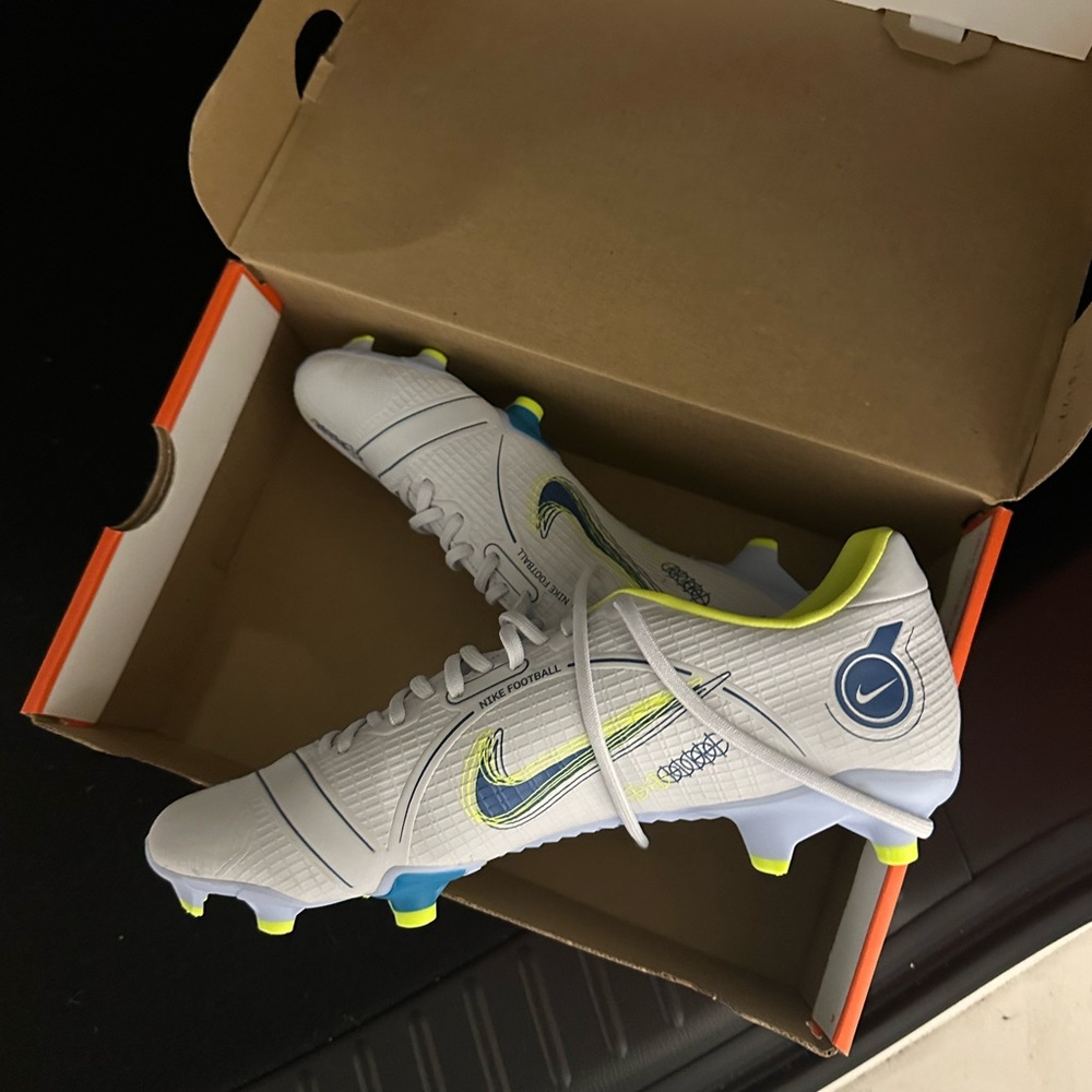 Nike White and Blue Soccer Cleats with Yellow Highlights
